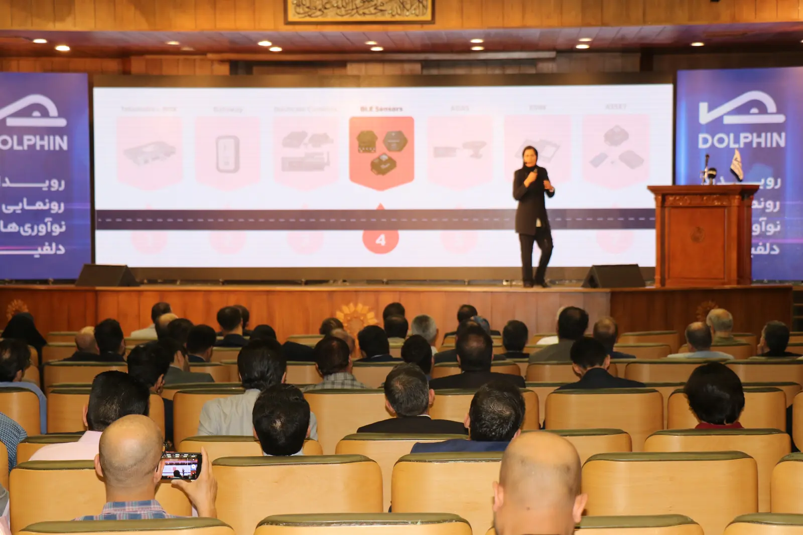 Fatemeh Jamali speaking about IoT product development on stage