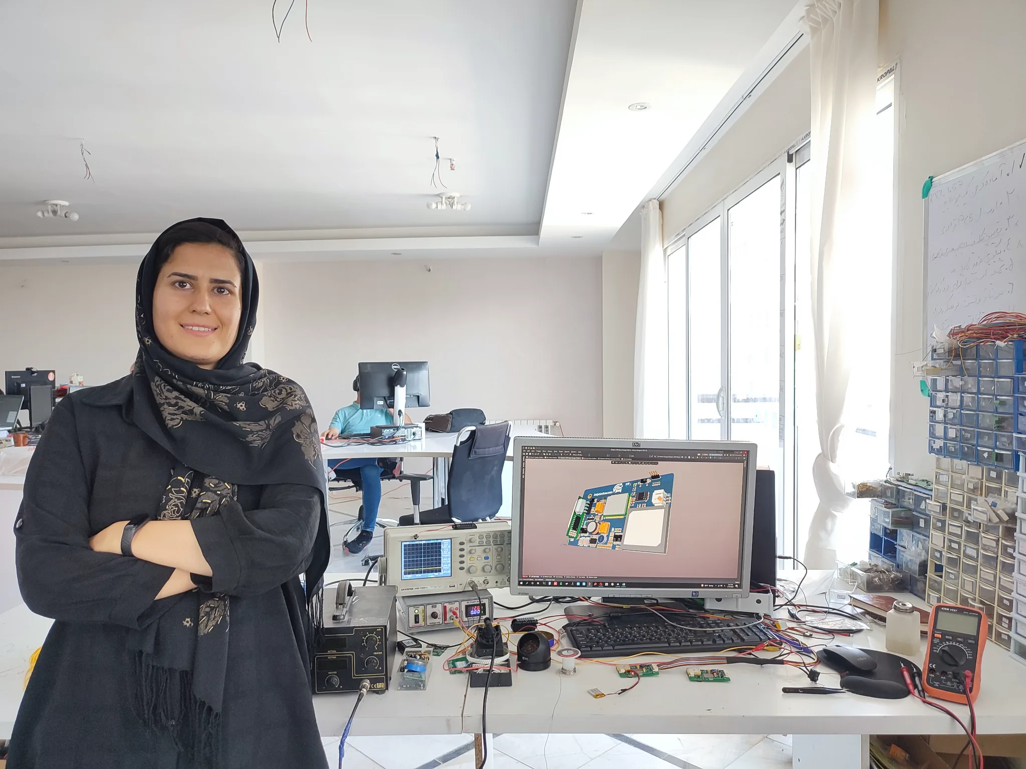 Fatemeh Jamali in an IoT product development workspace